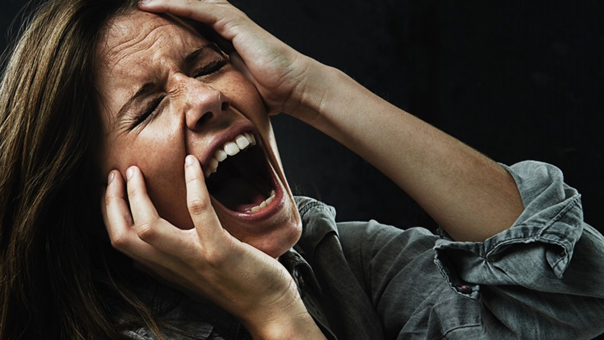 terrified woman istock