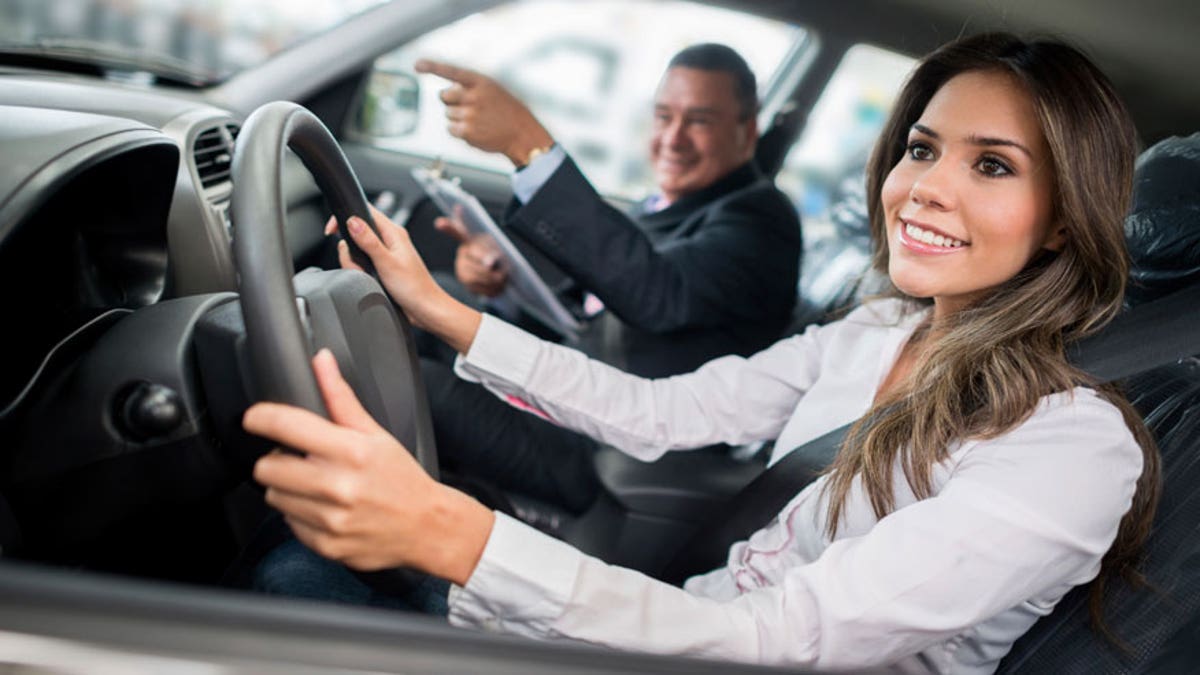 Woman buying a car