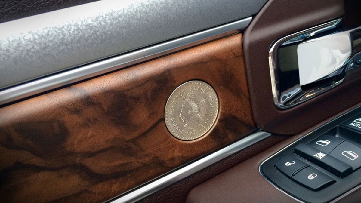 2015 Ram 1500 Texas Ranger Concept truck -  walnut wood trim door panel with coins and galvanized spear