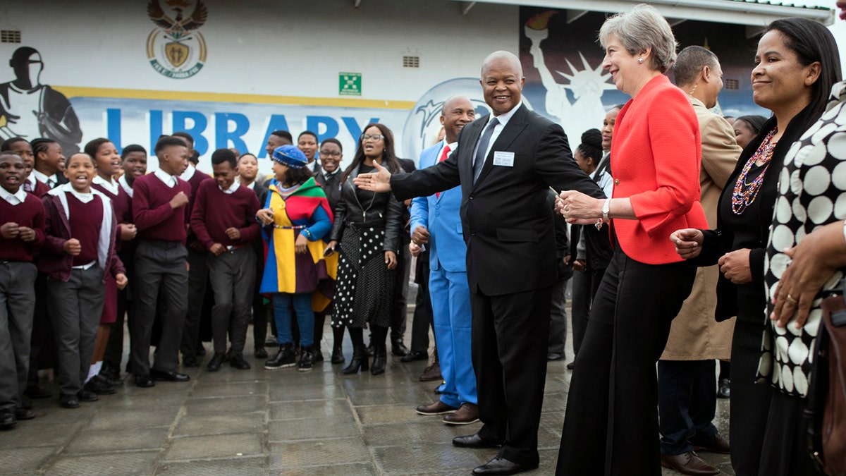 Theresa May dancing