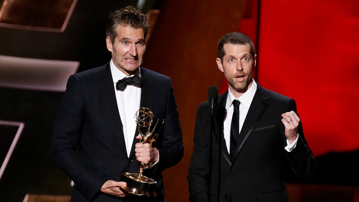 David Benioff (L) and D.B. Weiss accept the award for Outstanding Writing For A Drama Series for HBO's 