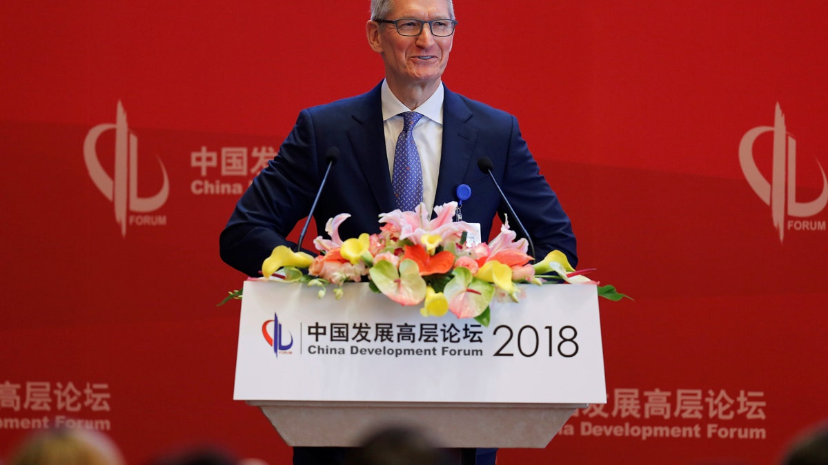 b9274d60-tim cook china rutgers