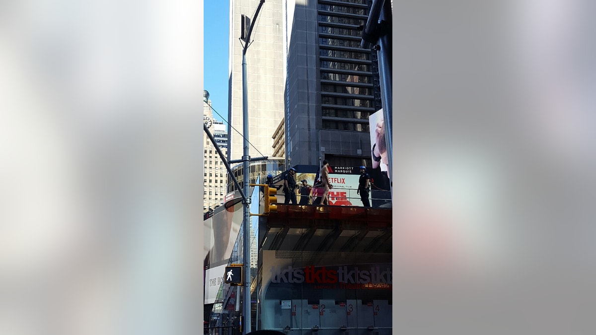 times square naked man 630