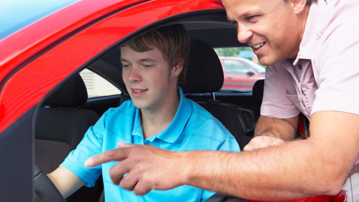 Teenage Boy Learning How To Drive