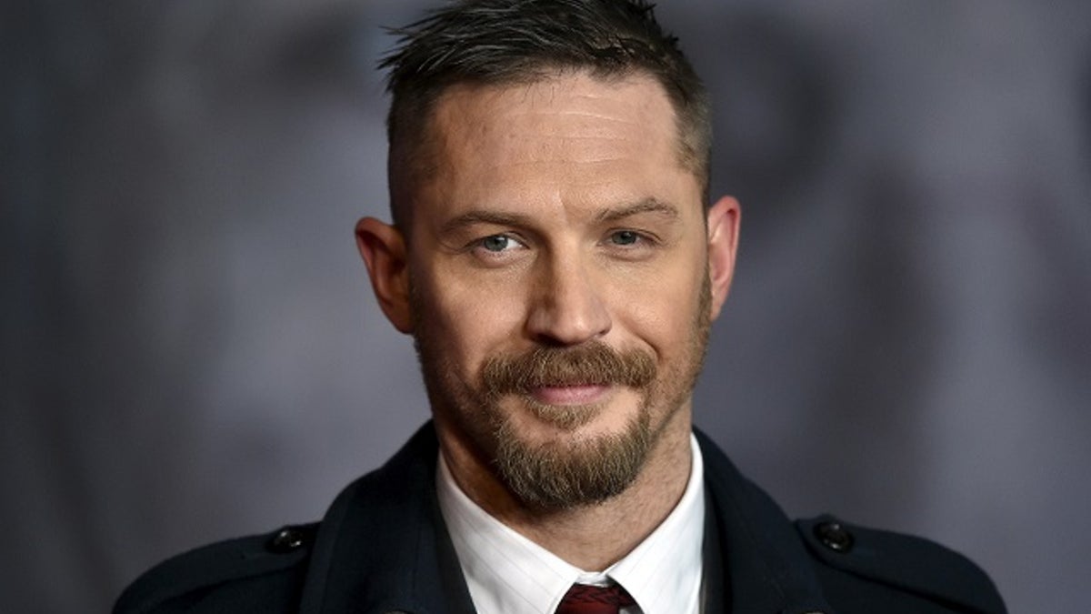 Actor Tom Hardy poses as he arrives for the British premiere of 