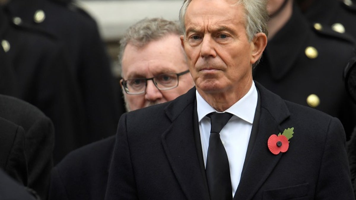 Britain's ex-Prime Minister Tony Blair stands in silence at the Remembrance Sunday Cenotaph service in London, Britain, November 12, 2017. REUTERS/Toby Melville - RC15665F6D80