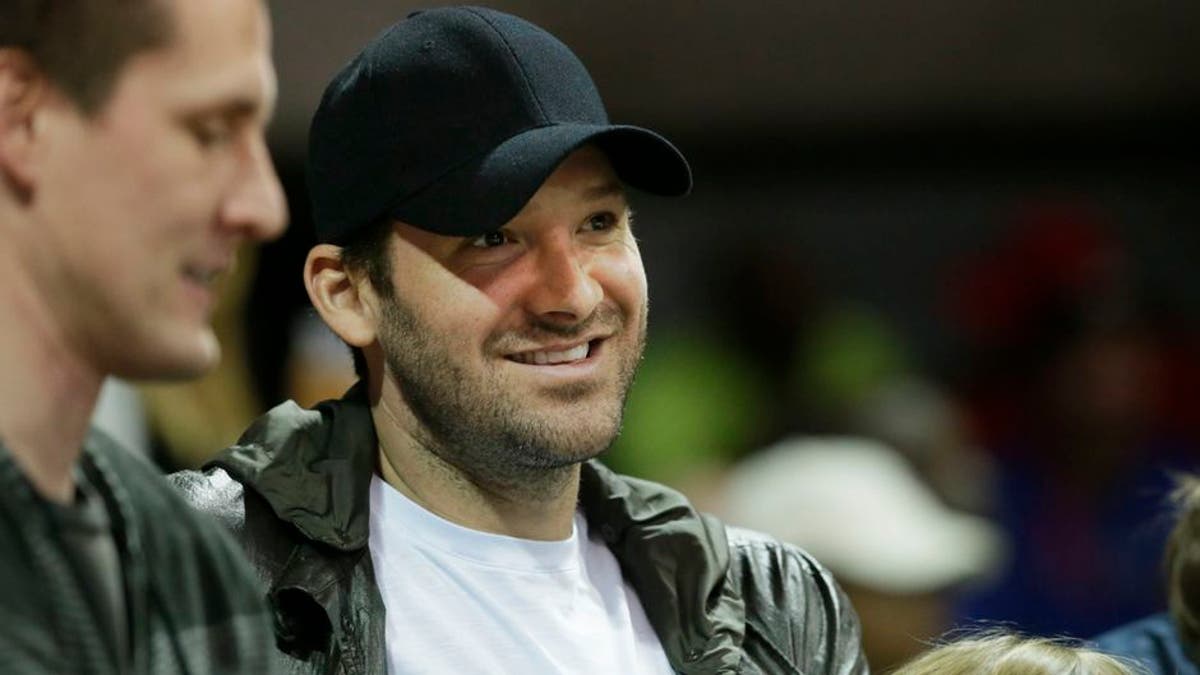 Dallas Cowboys quarterback Tony Romo watches during the first half of an NCAA college basketball game between Cincinnati and SMU in Dallas, Sunday, Feb. 12, 2017. (AP Photo/LM Otero)