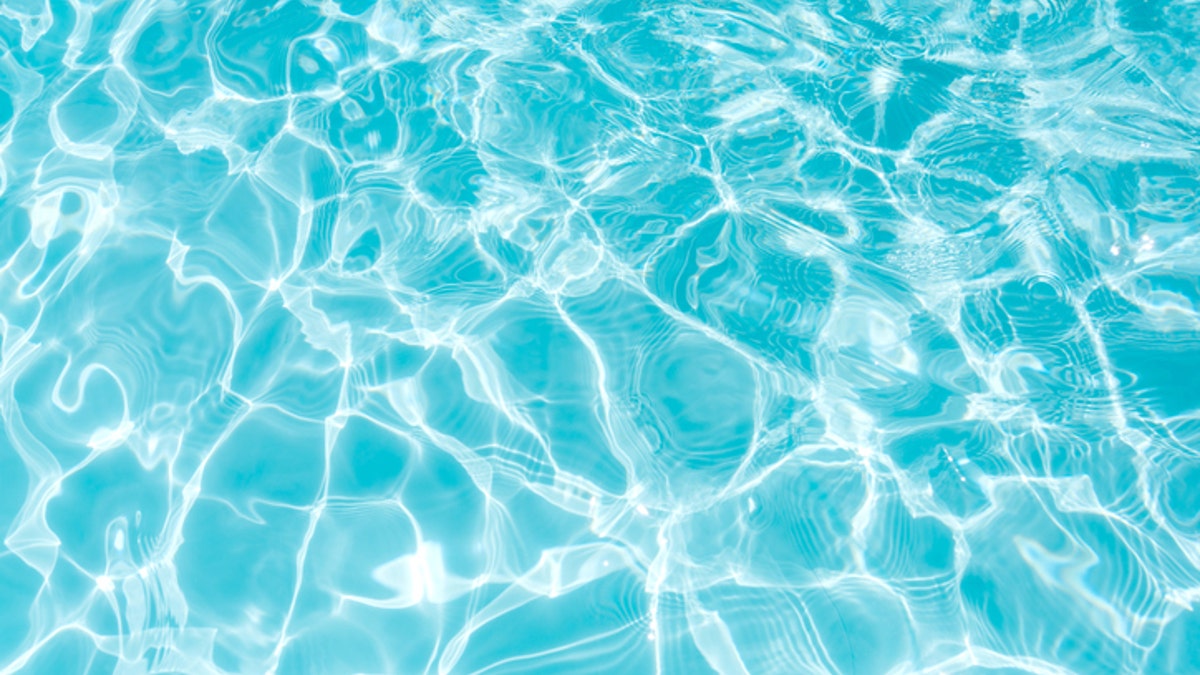 Beautiful ripple wave and blue water surface in swimming pool