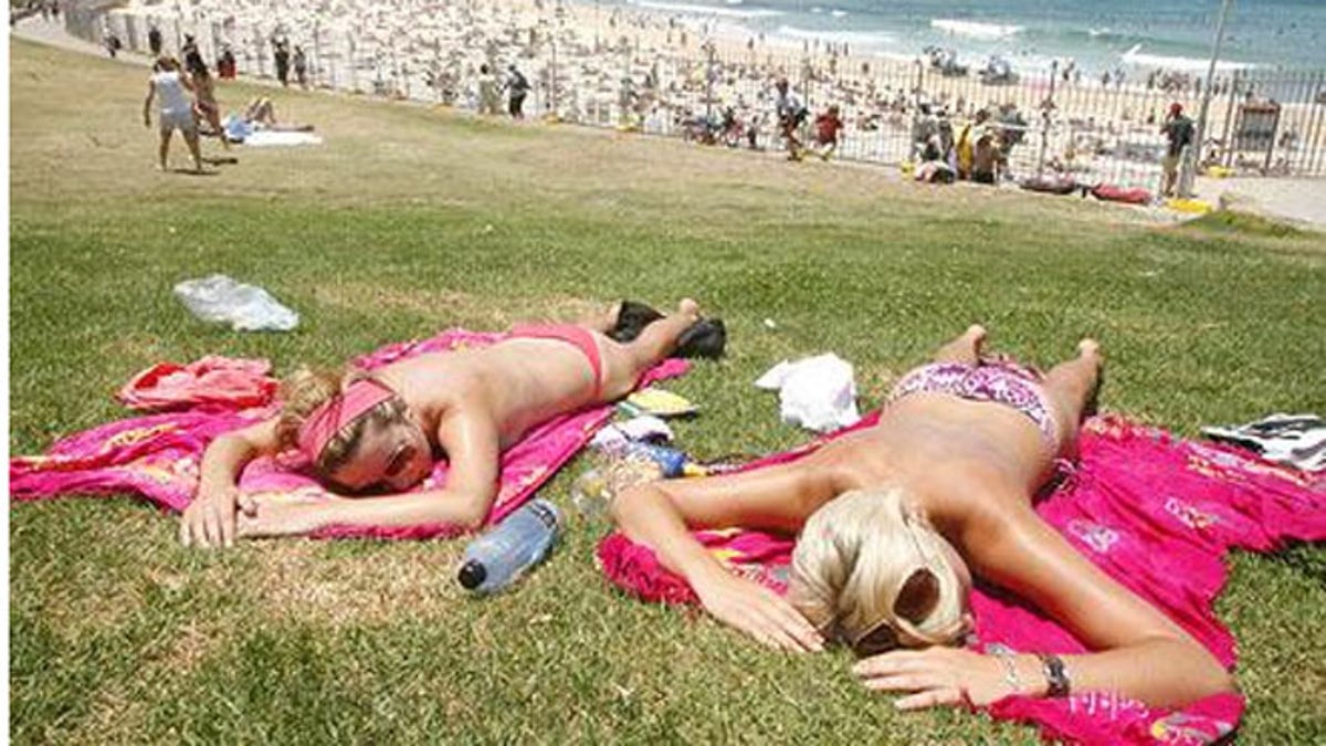 Beach Girls Sunbathing Topless - Survey reveals global acceptance of topless beachgoers, Speedos | Fox News