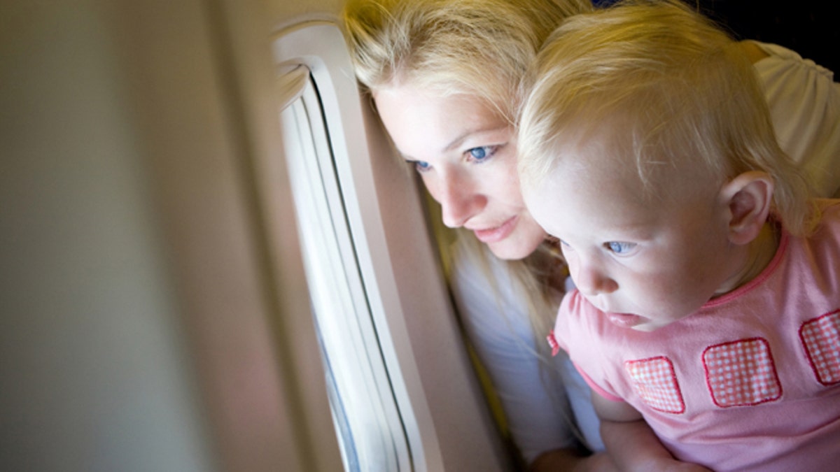 looking through the window of the plane