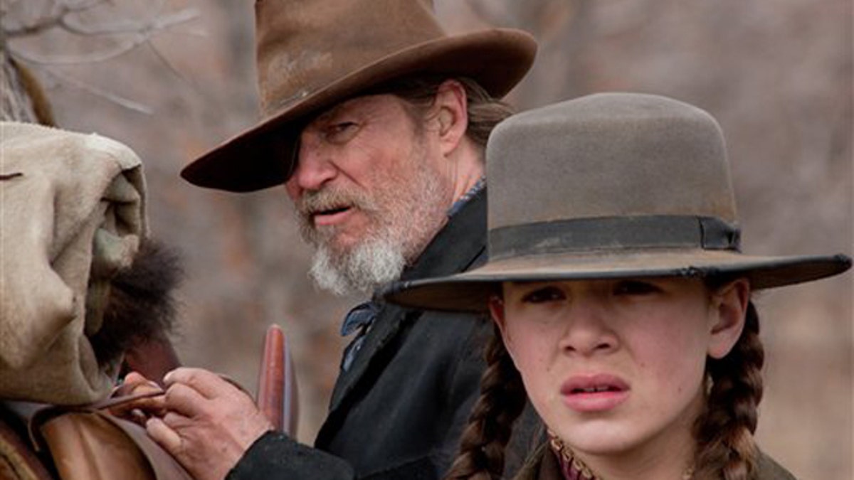 In this undated film publicity image released by Paramount Pictures, Jeff Bridges, left, and Hailee Steinfeld are shown in a scene from 