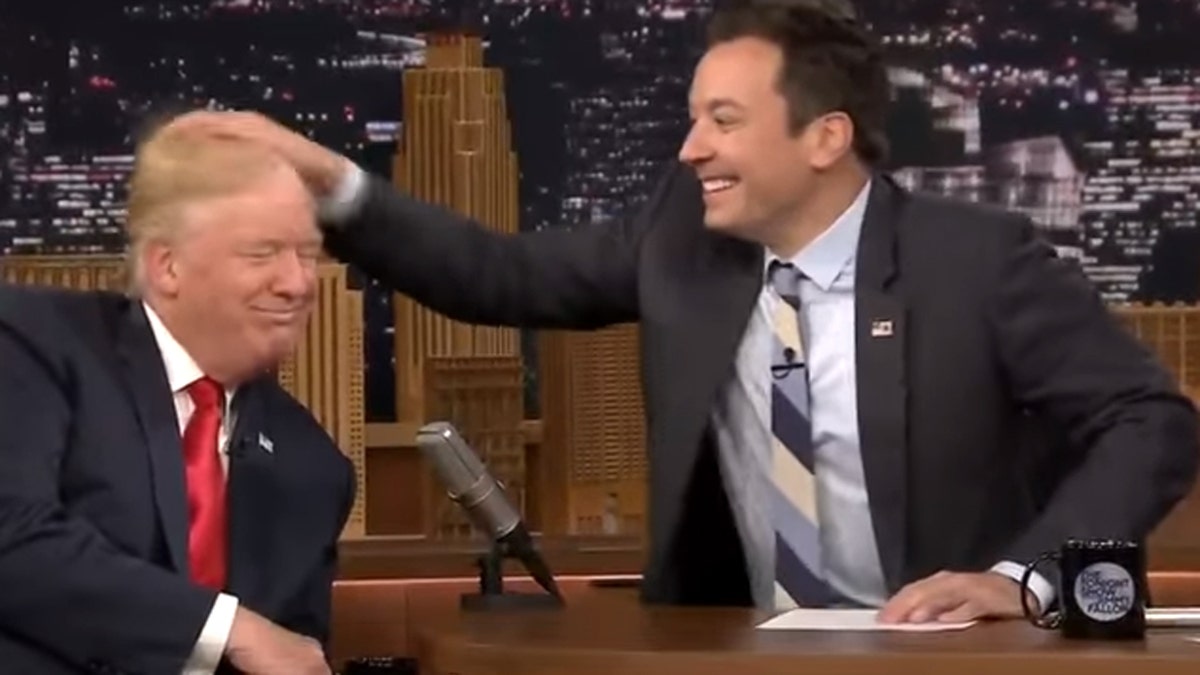 Jimmy Fallon plays with the hair of then-Republican presidential candidate Donald Trump on a Sept. 15, 2016 episode of 'The Tonight Show'