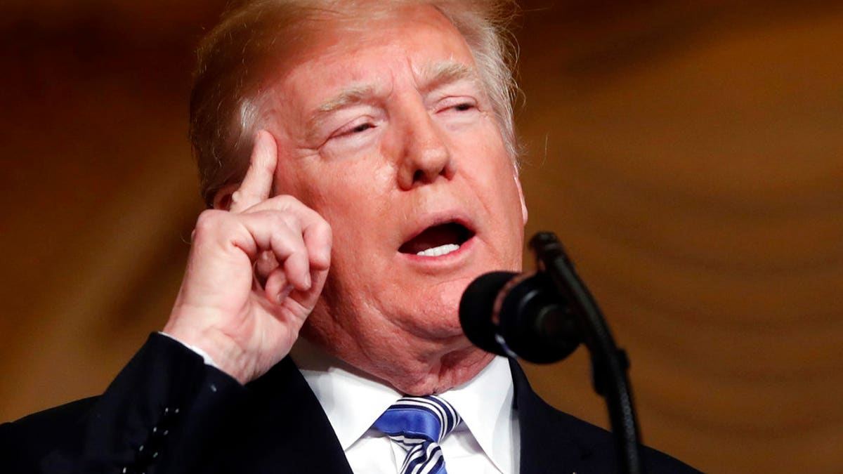 President Donald Trump speaks during a news conference with Japanese Prime Minister Shinzo Abe at Trump's private Mar-a-Lago club, Wednesday, April 18, 2018, in Palm Beach, Fla. (AP Photo/Pablo Martinez Monsivais)