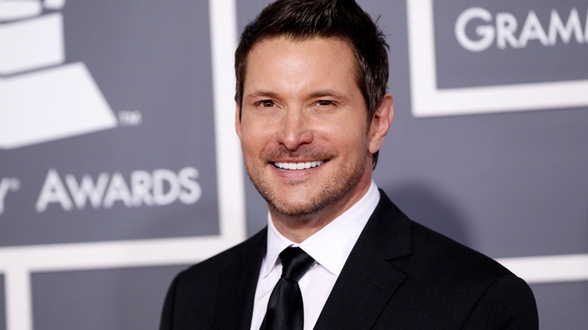 Country and Christian music singer Ty Herndon arrives at the 53rd annual Grammy Awards in Los Angeles, California, February 13, 2011.