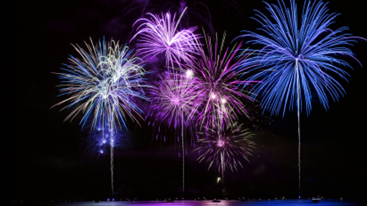 Colorful Fireworks over Lake