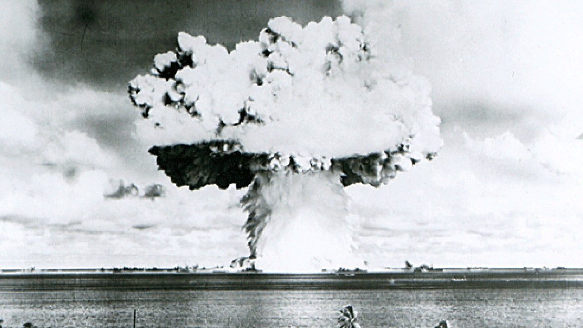 This U.S. Navy handout image shows Baker, the second of the two atomic bomb tests, in which a 63-kiloton warhead was exploded 90 feet under water as part of Operation Crossroads, conducted at Bikini Atoll in July 1946 to measure nuclear weapon effects on warships. The United States said on April 25, 2014, it was examining lawsuits filed by the Marshall Islands against it and eight other nuclear-armed countries that accuse them of failing in their obligation to negotiate nuclear disarmament.  REUTERS/U.S. Navy/Handout via Reuters (MARSHALL ISLANDS - Tags: POLITICS MILITARY CONFLICT) ATTENTION EDITORS - FOR EDITORIAL USE ONLY. NOT FOR SALE FOR MARKETING OR ADVERTISING CAMPAIGNS. THIS PICTURE WAS PROVIDED BY A THIRD PARTY. REUTERS IS UNABLE TO INDEPENDENTLY VERIFY THE AUTHENTICITY, CONTENT, LOCATION OR DATE OF THIS IMAGE. THIS PICTURE IS DISTRIBUTED EXACTLY AS RECEIVED BY REUTERS, AS A SERVICE TO CLIENTS - GM1EA4Q0L6601