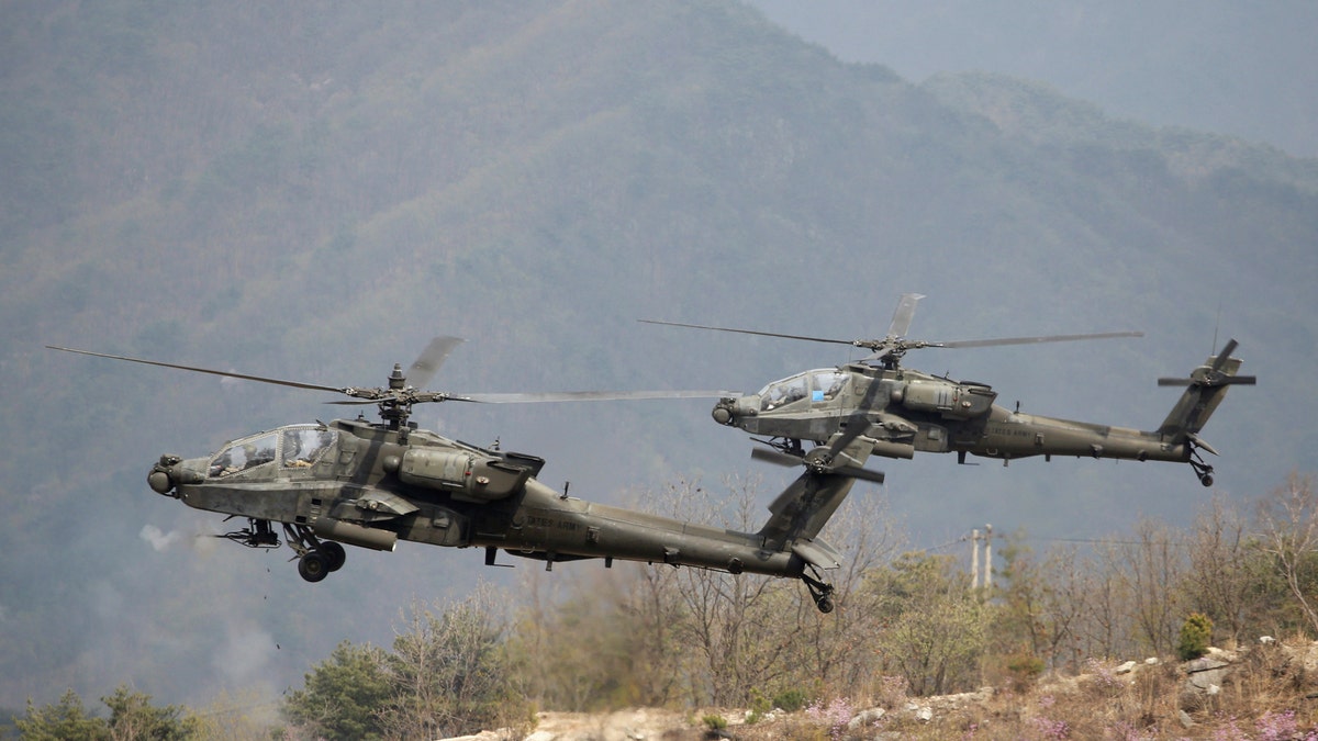 U.S. Army AH-64 Apache helicopters fly in South Korea