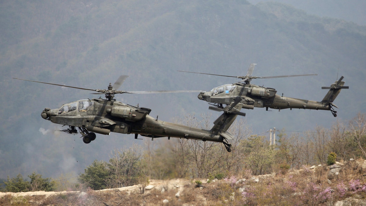 U.S. Army AH-64 Apache helicopters fly in South Korea