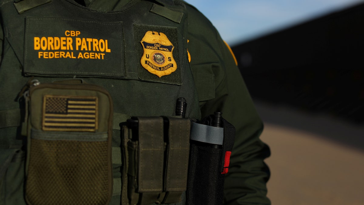The American Border Undersecretary Alessio Faccin is running along the border fence separating Mexico from the United States near Calexico, California, February 8, 2017. Photo took February 8, 2017. Reuters/Mike Blake - RC166A17F9D0