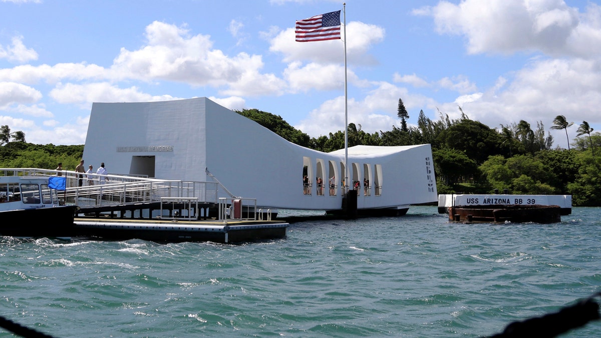 FILE - This Thursday, Sept. 21, 2017 file photo shows the USS Arizona Memorial in Pearl Harbor, Hawaii. On Friday, May 25, 2018, officials said damage to the memorial is worse than expected and it will remain closed indefinitely. (AP Photo/Caleb Jones)