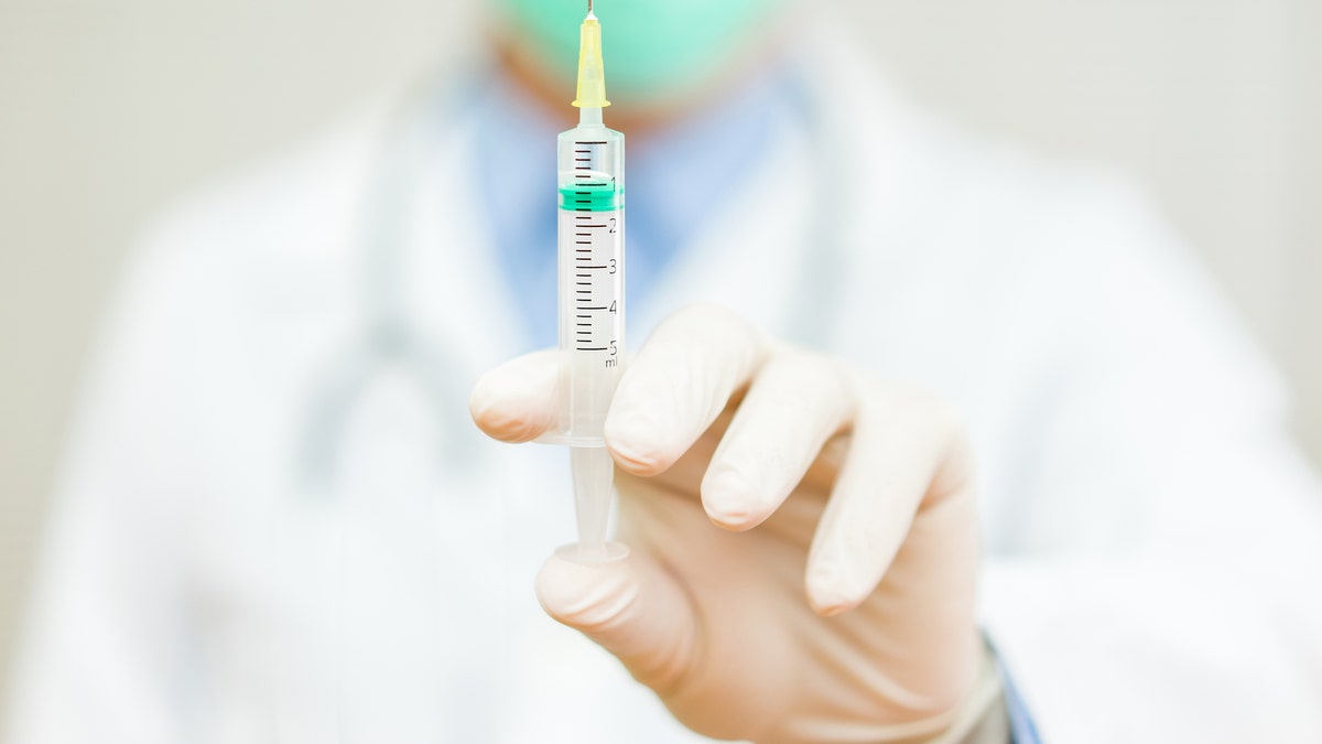 vaccine needle doctor istock large