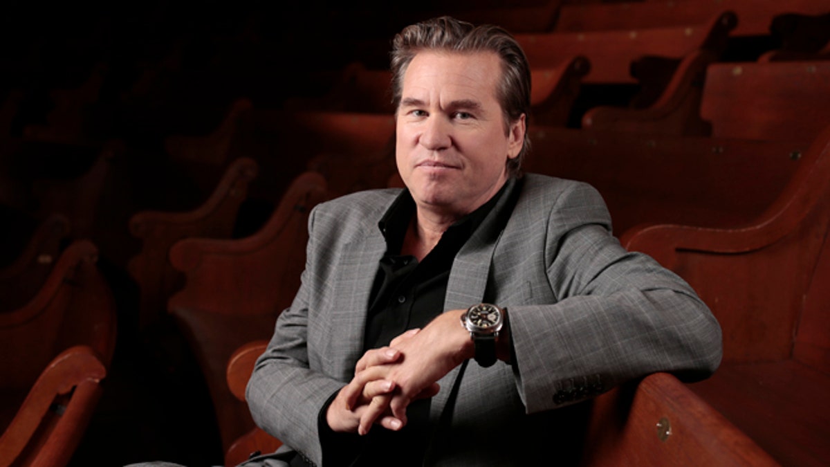 FILE - In this Jan. 9, 2014 file photo, Val Kilmer poses for a portrait in Nashville, Tenn. Kilmer wrote on Reddit April 26, 2017, that he?s had ?a healing of cancer.? (AP Photo/Mark Humphrey, File)