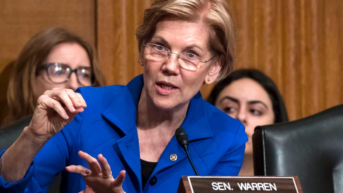 Sen. Elizabeth Warren, D-Mass., asks questions during a hearing of the Senate Health, Education, Labor, and Pensions Committee, on Capitol Hill in Washington, Tuesday, Dec. 12, 2017. (AP Photo/J. Scott Applewhite)