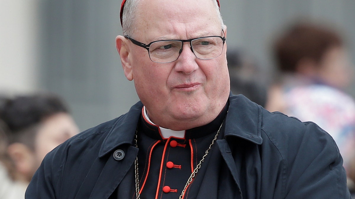 U.S. cardinal Timothy Dolan looks on as Pope Francis leads the weekly general audience in Saint Peter's Square at the Vatican February 22, 2017. REUTERS/Max Rossi - RC1C1AFAD4C0