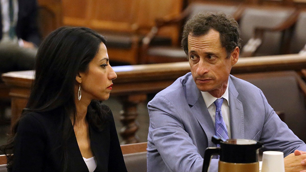 Anthony Weiner, right, and Huma Abedin appear in court in New York on Wednesday, Sept. 13, 2017. The couple asked a New York City judge to ask for privacy in their divorce case. (Jefferson Siegel/The Daily News via AP, Pool)