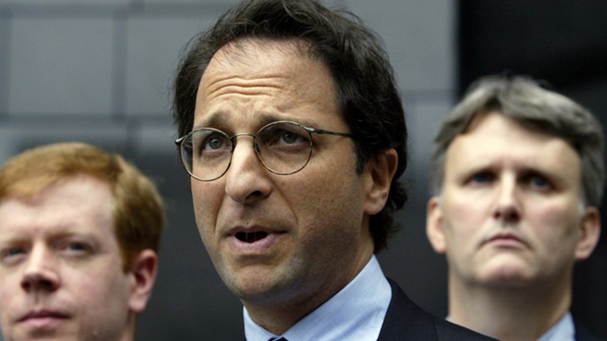 Federal prosecutor Andrew Weissmann (C) is flanked by FBI agents as hespeaks to the press outside the federal courthouse in Houston, Texasabout the latest round of indictments stemming from the collapse ofEnron, May 1, 2003. Also Lea Fastow, wife of Enron Chief FinancialOfficer Andrew Fastow, is expected to be indicted on tax and mailfraud. REUTERS/Jeff MitchellJM/ME - RTRMRJX