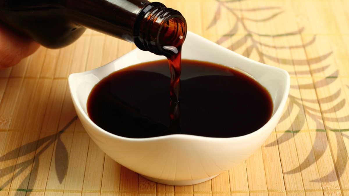 Pouring Soy Sauce into bowl