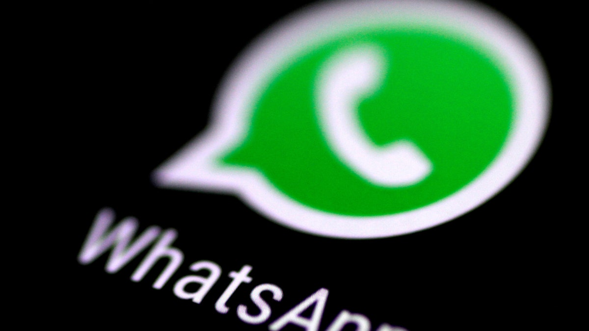 The WhatsApp messaging application is seen on a phone screen August 3, 2017.   REUTERS/Thomas White - RC1E1EA0A900
