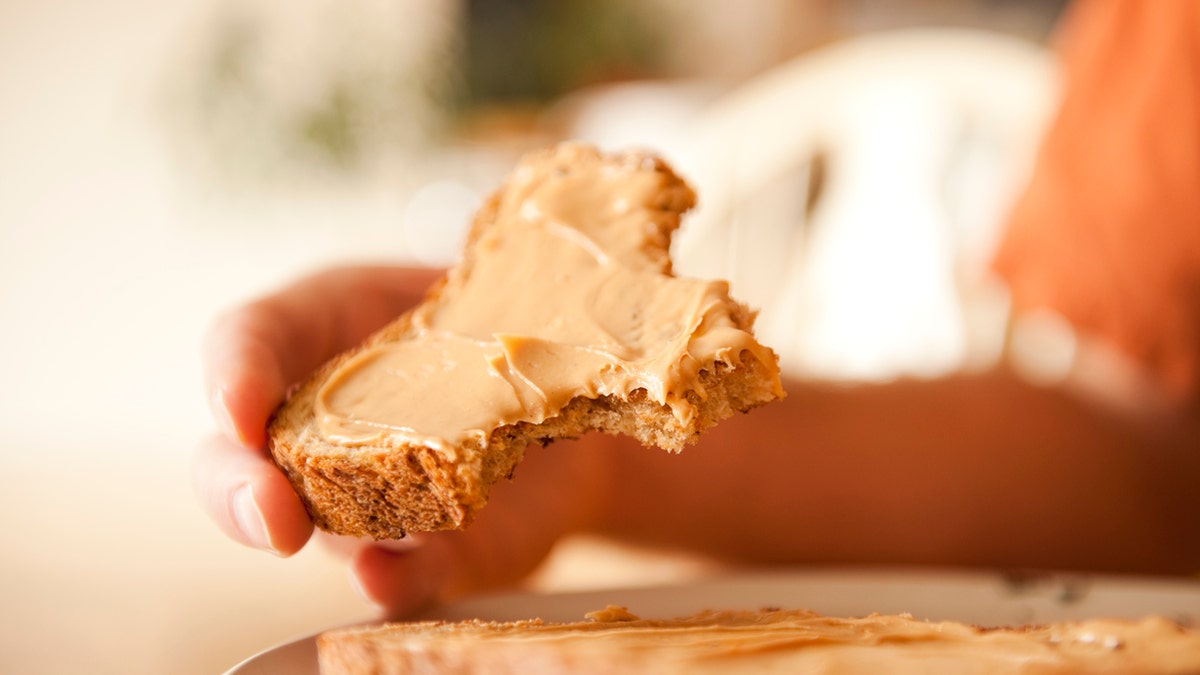 whole wheat bread with peanut butter istock medium