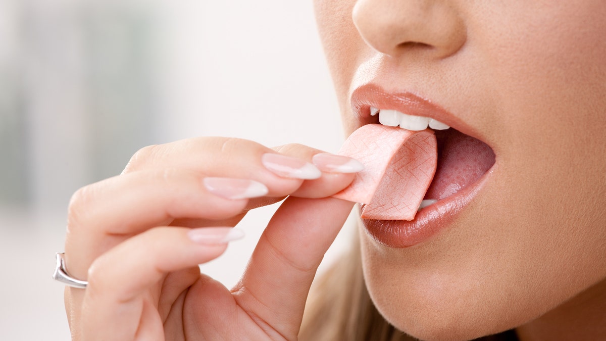 woman chewing gum istock medium