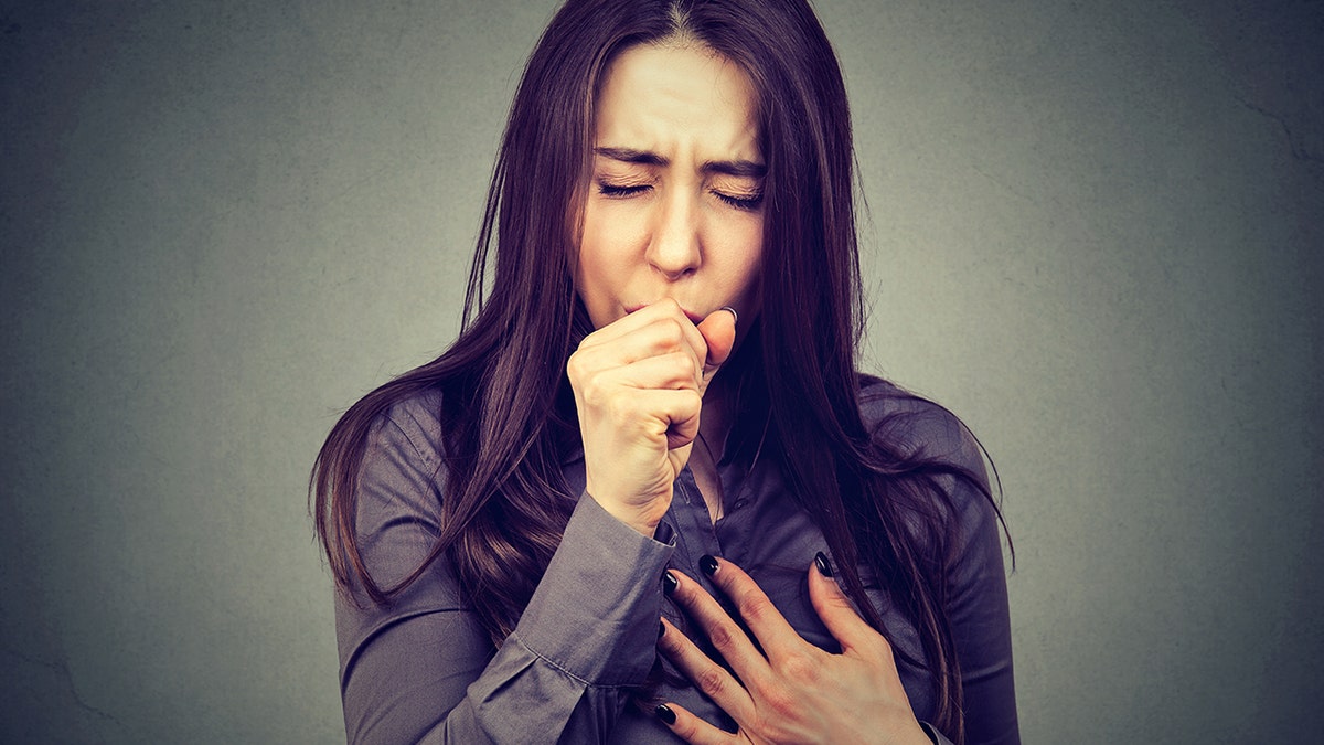 woman coughing