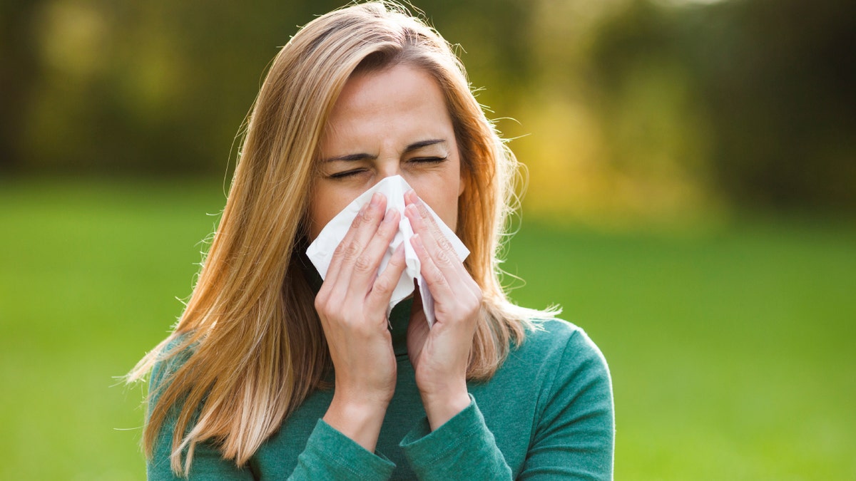 woman with allergies istock