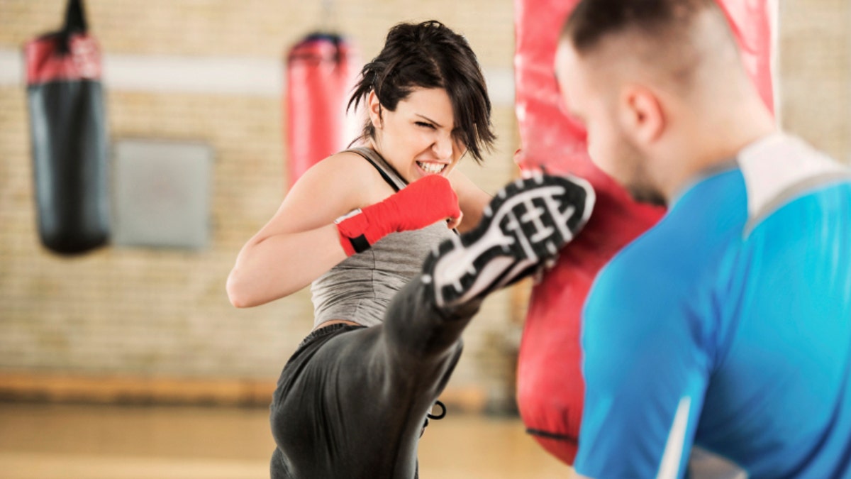 Woman exercising boxing.