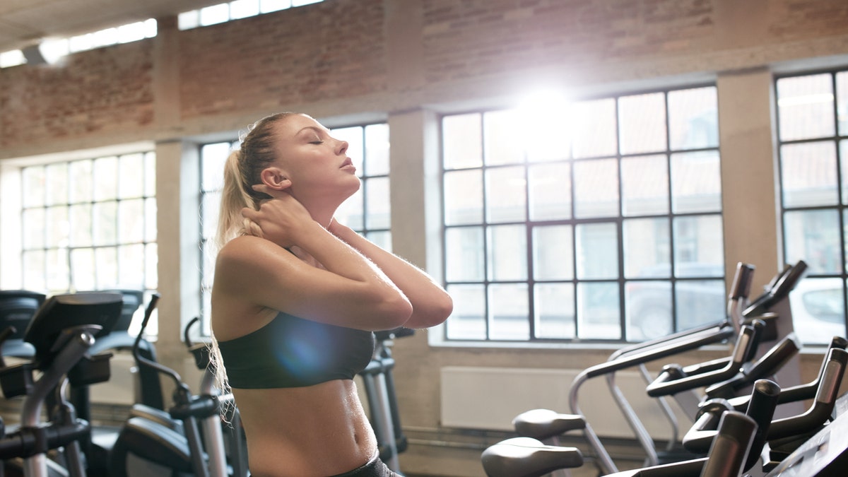 young woman working out tired istock medium