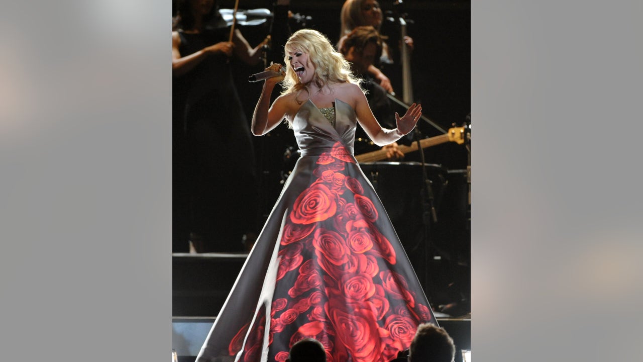 carrie underwood red dress sunday night football Hear Carrie Underwood's Sunday Night Football Theme In Full