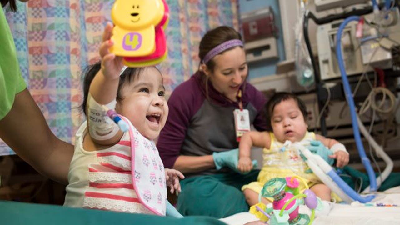 Formerly conjoined twins doing better - in time for Mother's Day