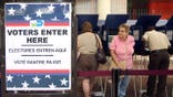 MIAMI - OCTOBER 21:  Hispanic voters go to the polls for early voting at the Miami-Dade Government Center on October 21, 2004 in Miami, Florida. Early voting began this week in Florida and is under heavy scrutiny after the debacle in the 2000 election.  (Photo by G. De Cardenas/Getty Images)