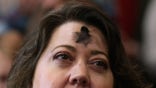 COLUMBIA, SC - FEBRUARY 10: A woman with a cross on his forehead for Ash Wednesday listens to Republican presidential candidate Sen. Marco Rubio (R-FL) during a campaign rally at the Columbia Metropolitan Convention Center February 10, 2016 in Columbia, South Carolina. Rubio placed fifth in the New Hampshire primary, behind fellow GOP candidates Jeb Bush, John Kasich, Sen. Ted Cruz (R-TX) and Donald Trump, who won with 35 percent of the vote. (Photo by Chip Somodevilla/Getty Images)