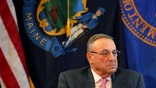 FILE- In this May 10, 2017, file photo, Maine Gov. Paul LePage pauses during a meeting to discuss the state's efforts to fight the opioid epidemic at the State House in Augusta, Maine. The American Civil Liberties Union of Maine sued LePage on Tuesday, Aug. 8, 2017, for blocking critics on his official Facebook page and deleting their comments. The ACLU filed the federal lawsuit on behalf of two women, saying their First Amendment rights were violated.  (AP Photo/Robert F. Bukaty, File)