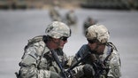 U.S. Army soldiers take part in a U.S.-South Korea joint live-fire military exercise at a training field in Pocheon, south of the demilitarized zone separating the two Koreas, March 25, 2015. The exercise is part of Foal Eagle, an annual military training between U.S. and South Korea that runs from March 2 to April 24.  REUTERS/Kim Hong-Ji - RTR4US36