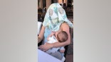 A breastfeeding mom told to cover up took a creative approach to her response.