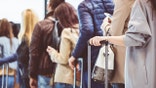 people at busy airport