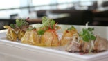 Dumplings are standard fare during Chinese New Year.  Their crescent shape symbolizes an old form of money and it's believed that eating them will bring wealth.