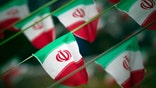 EDITORS' NOTE: Reuters and other foreign media are subject to Iranian restrictions on leaving the office to report, film or take pictures in Tehran.Iran's national flags are seen on a square in Tehran February 10, 2012, a day before the anniversary of the Islamic Revolution. REUTERS/Morteza Nikoubazl (IRAN - Tags: ANNIVERSARY POLITICS) - GM1E82B08N201