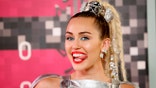 August 30, 2015. Singer and show host Miley Cyrus arrives at the 2015 MTV Video Music Awards in Los Angeles, California.
