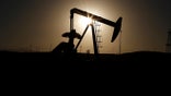 Oct. 14, 2014: A pump jack is seen at sunrise near Bakersfield, California. (Reuters)